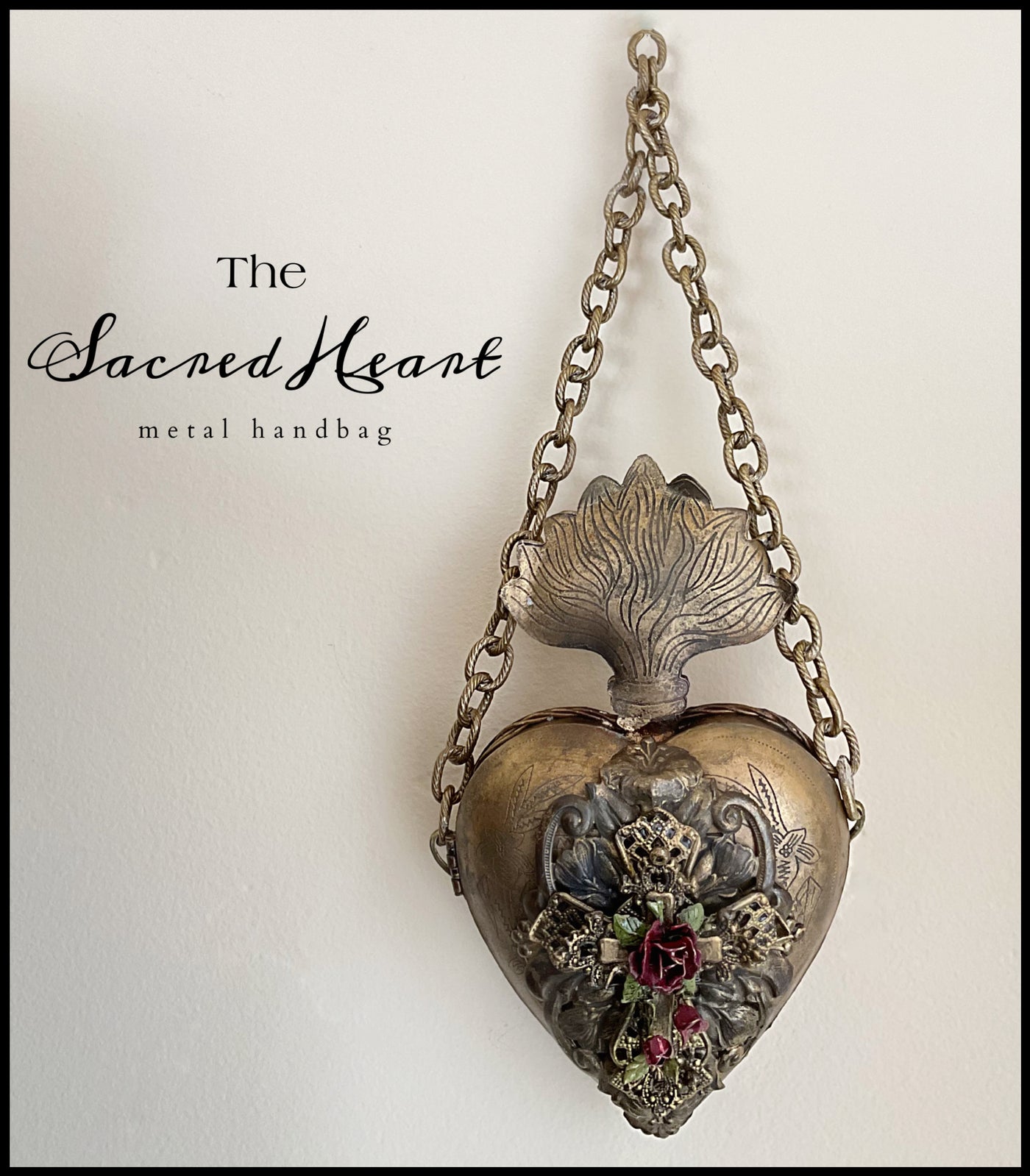 The SACRED HEART Metal handbag